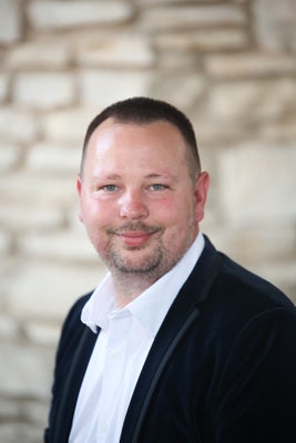 Portrait of Kevin Reeves, Local Agent